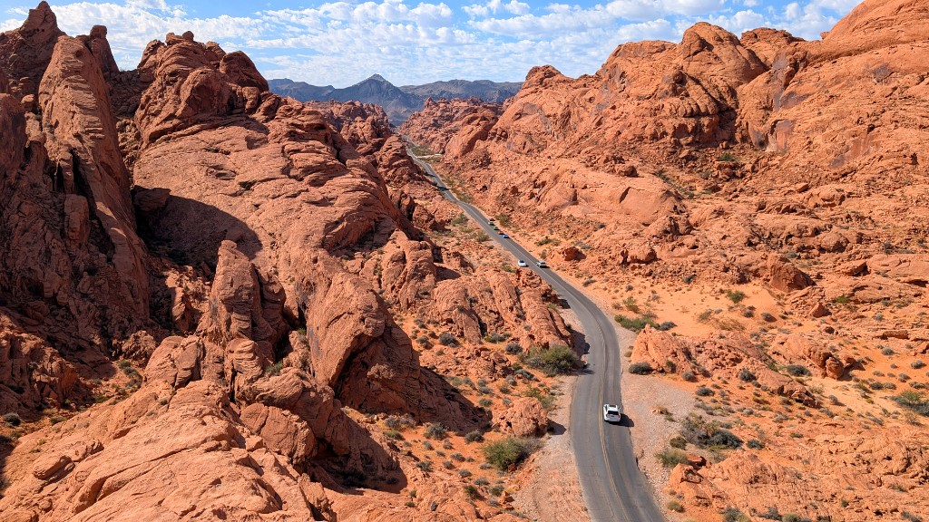 Road winding through red sandstone formations in Valley of Fire State Park, Nevada